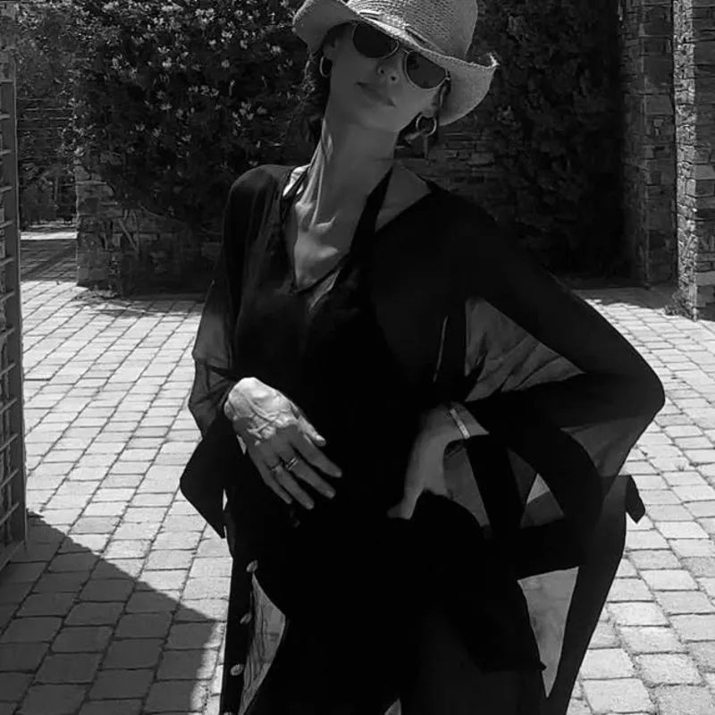Bianca Ella Booth-Tata Black Sheer Kaftan with Gold Buttons, Belt, and Asymmetric Hem