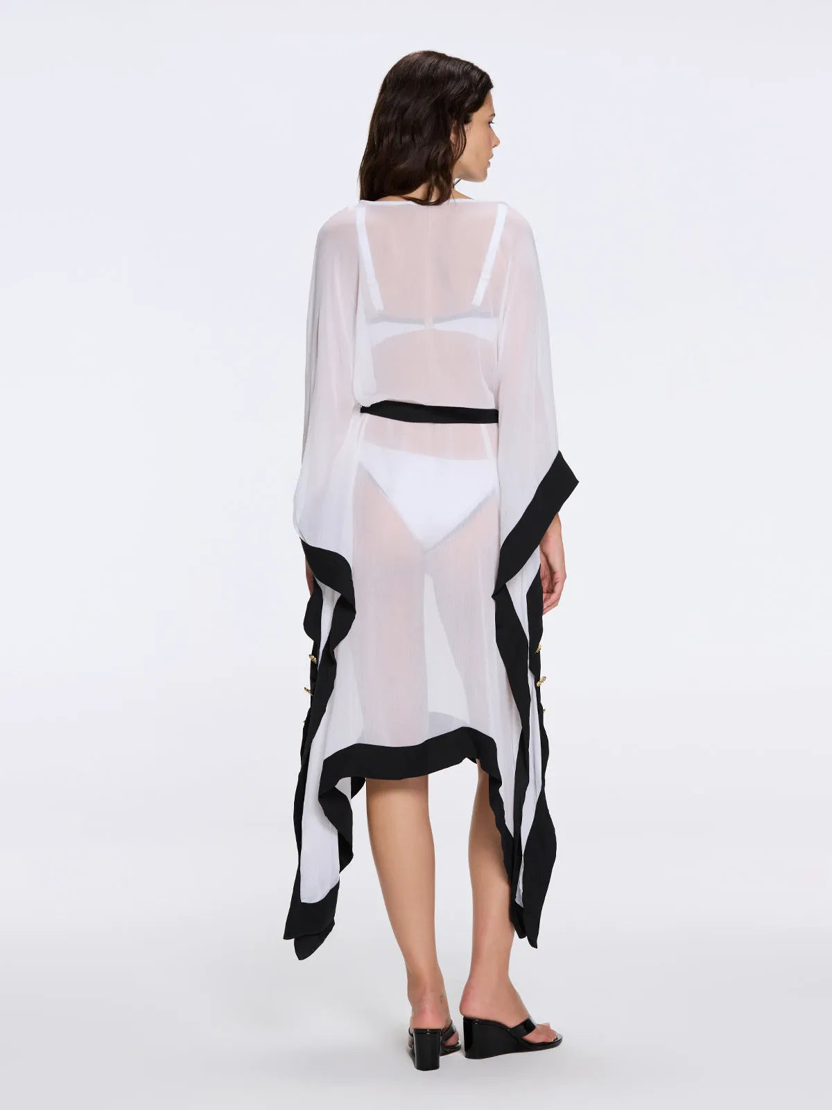 Tata Sheer Kaftan in White and Black with Gold Buttons, Belt, and Asymmetric Hem